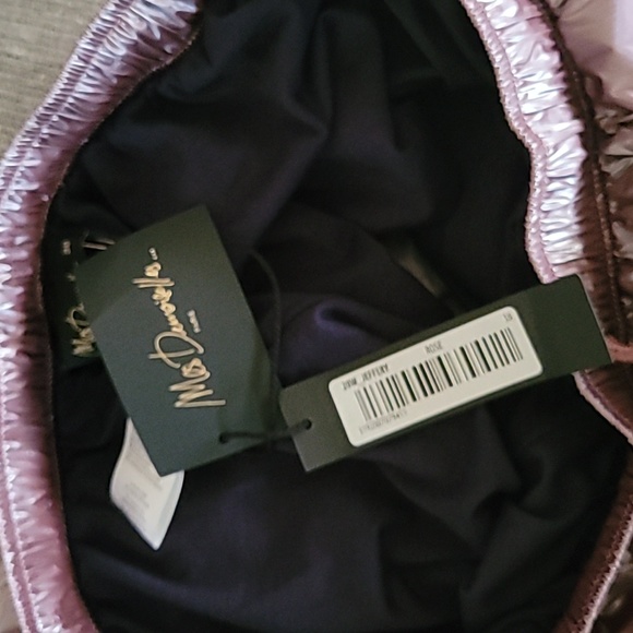 Pants they are brand new, rose color with stripes down the side. - Picture 9 of 10